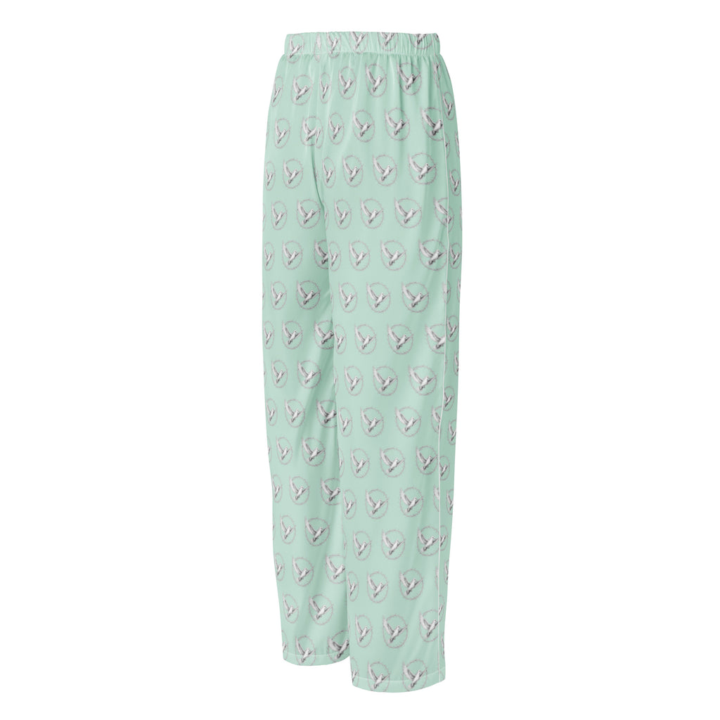 Light green pajama pants with a subtle pattern on a white background