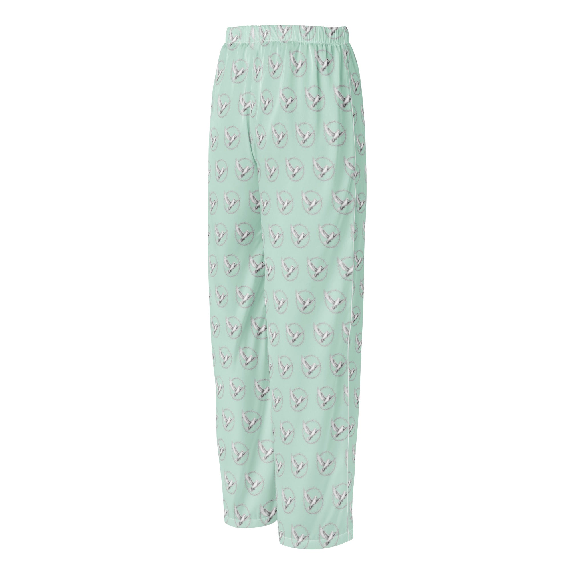 Light green pajama pants with a subtle pattern on a white background