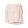 Light pink skirt with a dove and heart design on a white background