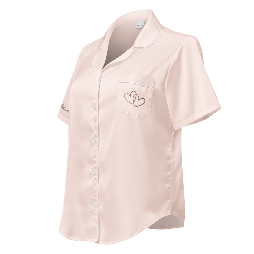 Light pink silk short-sleeve pajama shirt with a heart design on a white background