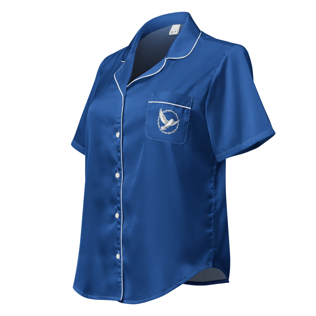 Blue satin shirt with a pocket and eagle emblem on a white background