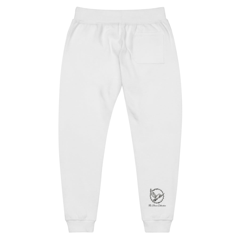 back of white fleece sweatpants with black dove with crowns with "The Dove Collective" written underneath on right front ankle. 
