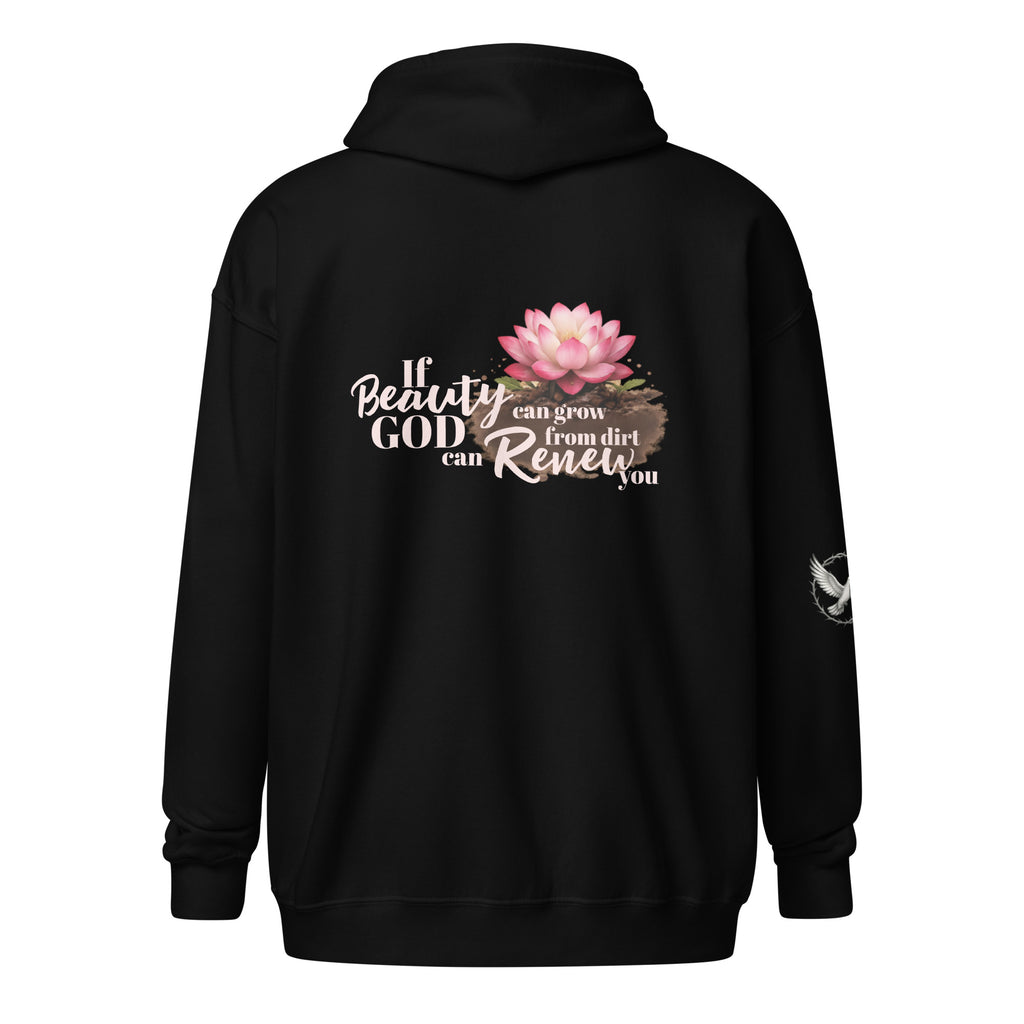 black hooded sweatshirt from the back, featuring a colorful pink lotus flower growing out of brown soil. Next to the flower is white and beige script text that reads, "If beauty can grow from dirt, God can renew you." There is also a small white dove on the right sleeve. 