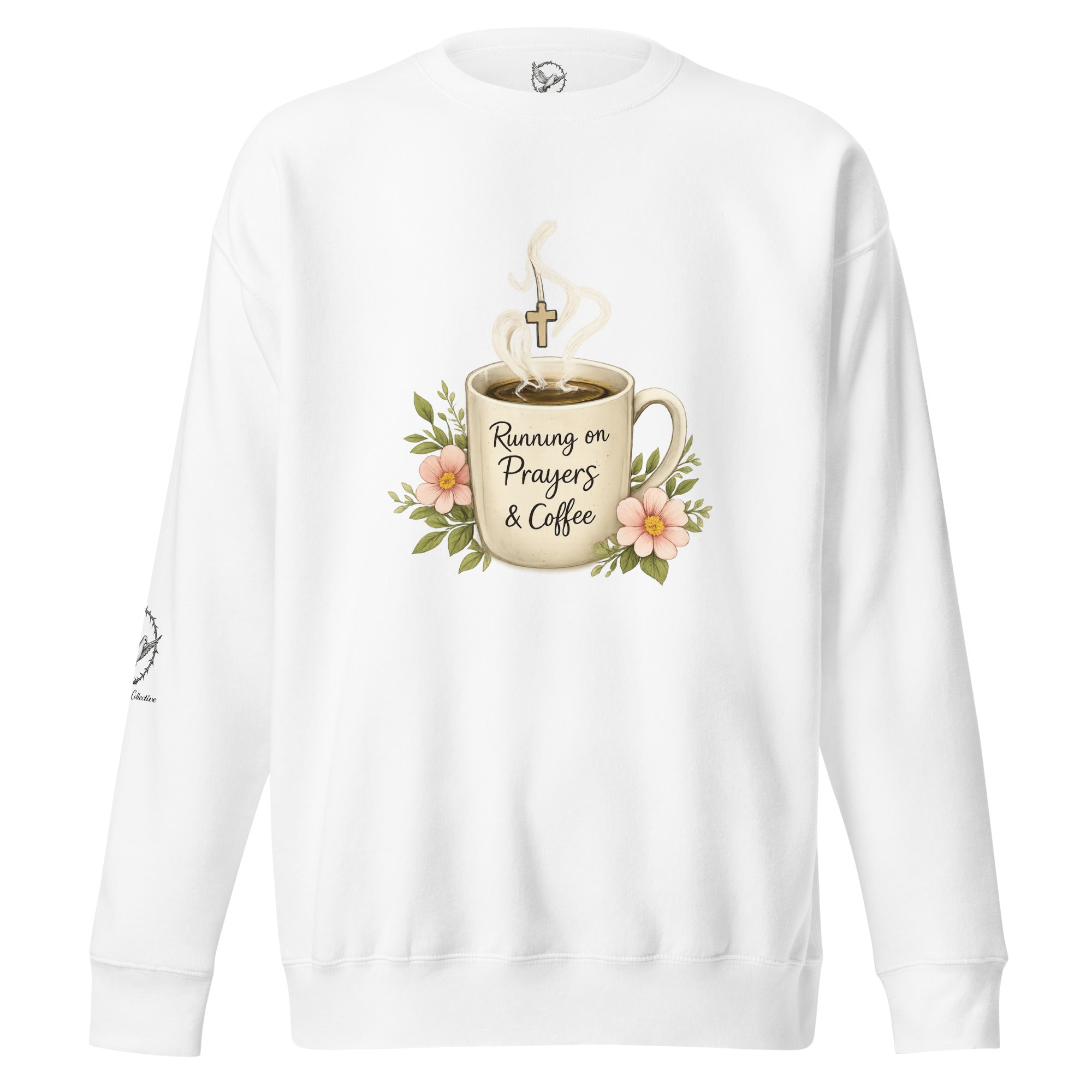 white sweatshirt with a coffee cup with words that read, "Running on prayers and coffee" featuring steam rising out of cup with a cross hanging off the steam.