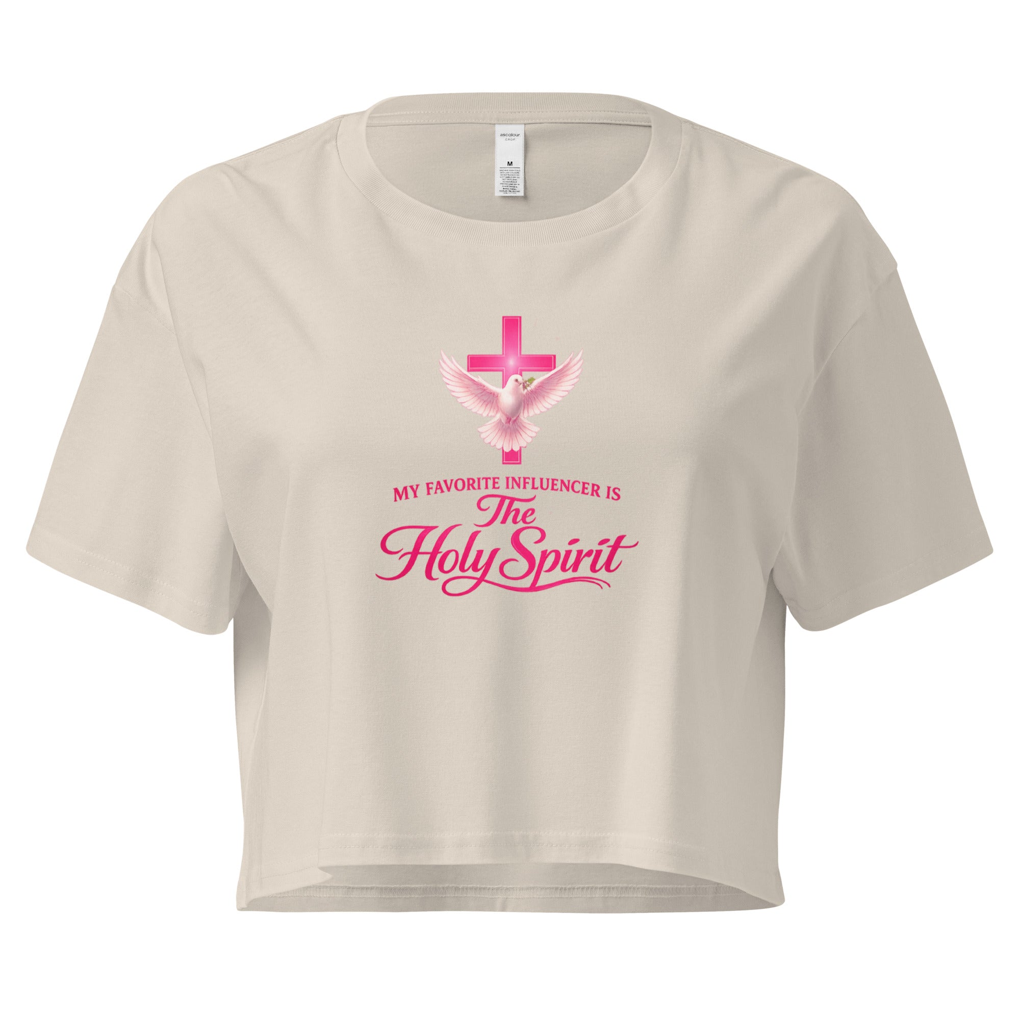 bone colored cropped Christian t-shirt with a pink cross and white dove graphic, featuring the phrase "My favorite influencer is The Holy Spirit" in pink lettering across the front
