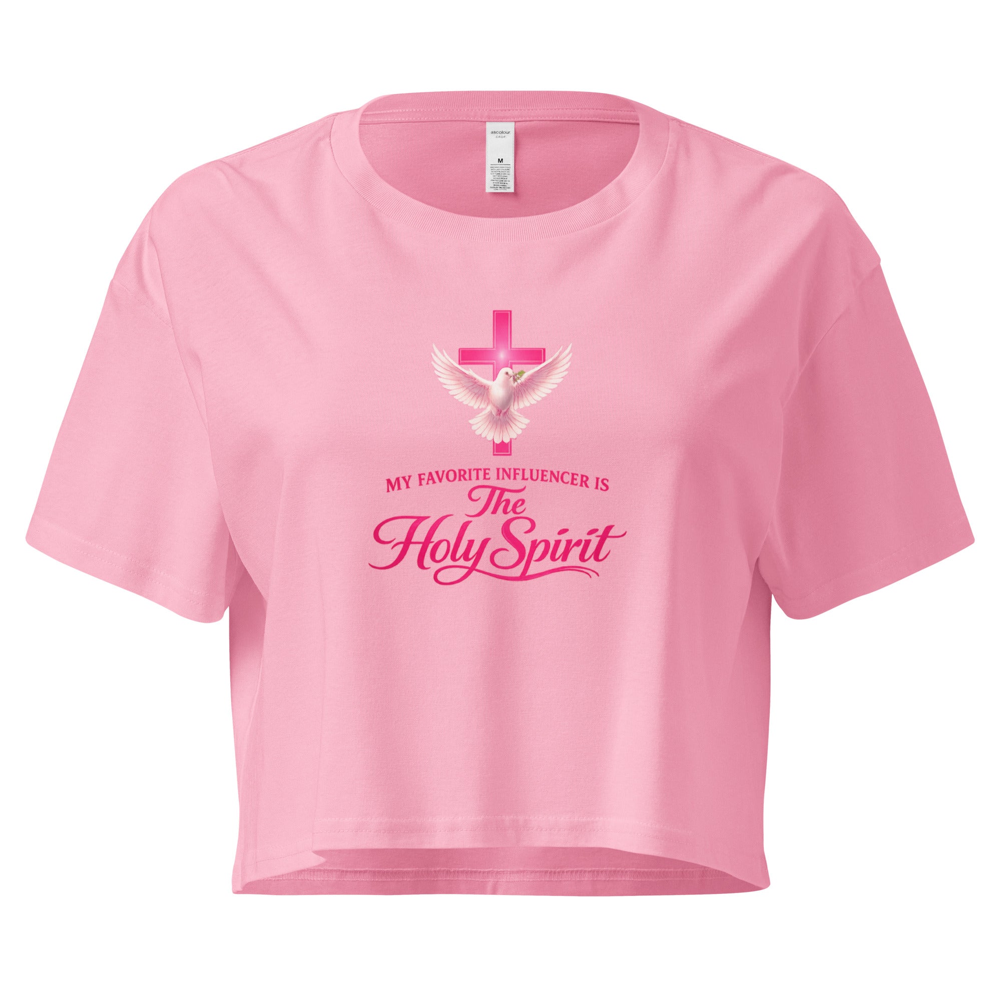 bubblegum pink cropped Christian t-shirt with a pink cross and white dove graphic, featuring the phrase "My favorite influencer is The Holy Spirit" in pink lettering across the front.