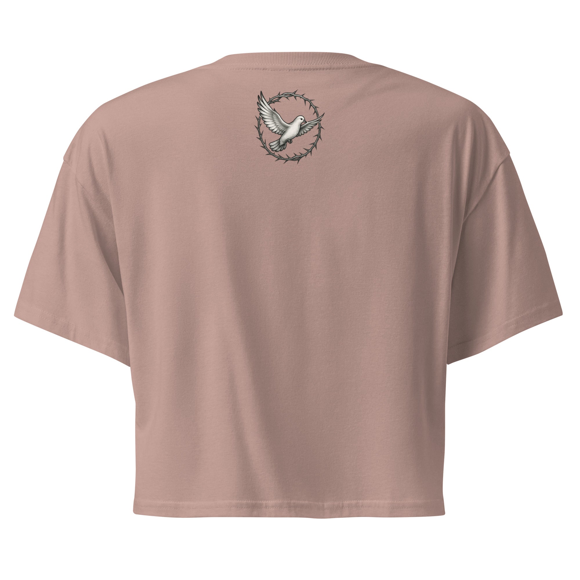 back of a hazy pink cropped Christian t-shirt featuring a small white dove centered between the shoulders surrounded by a circular crown of thorns design.