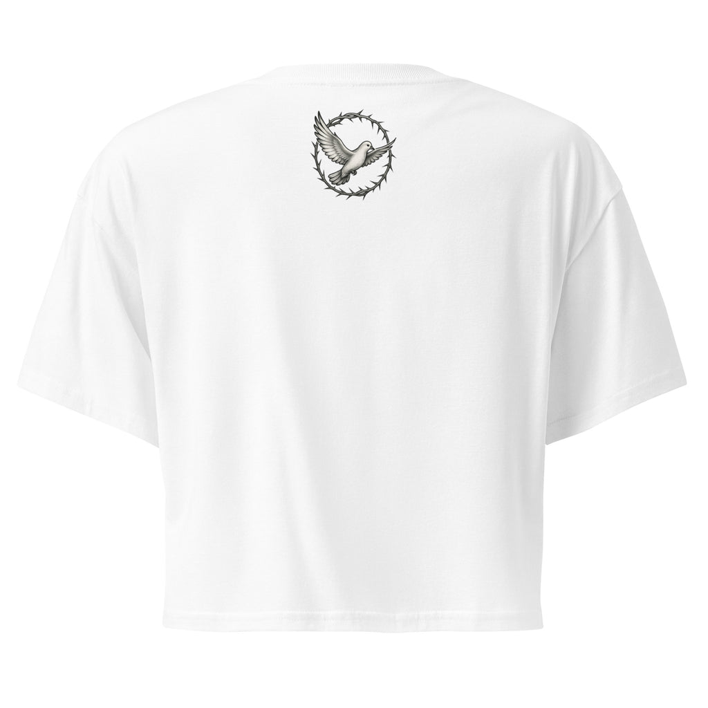 back of a white cropped Christian t-shirt featuring a small white dove centered between the shoulders surrounded by a circular crown of thorns design.